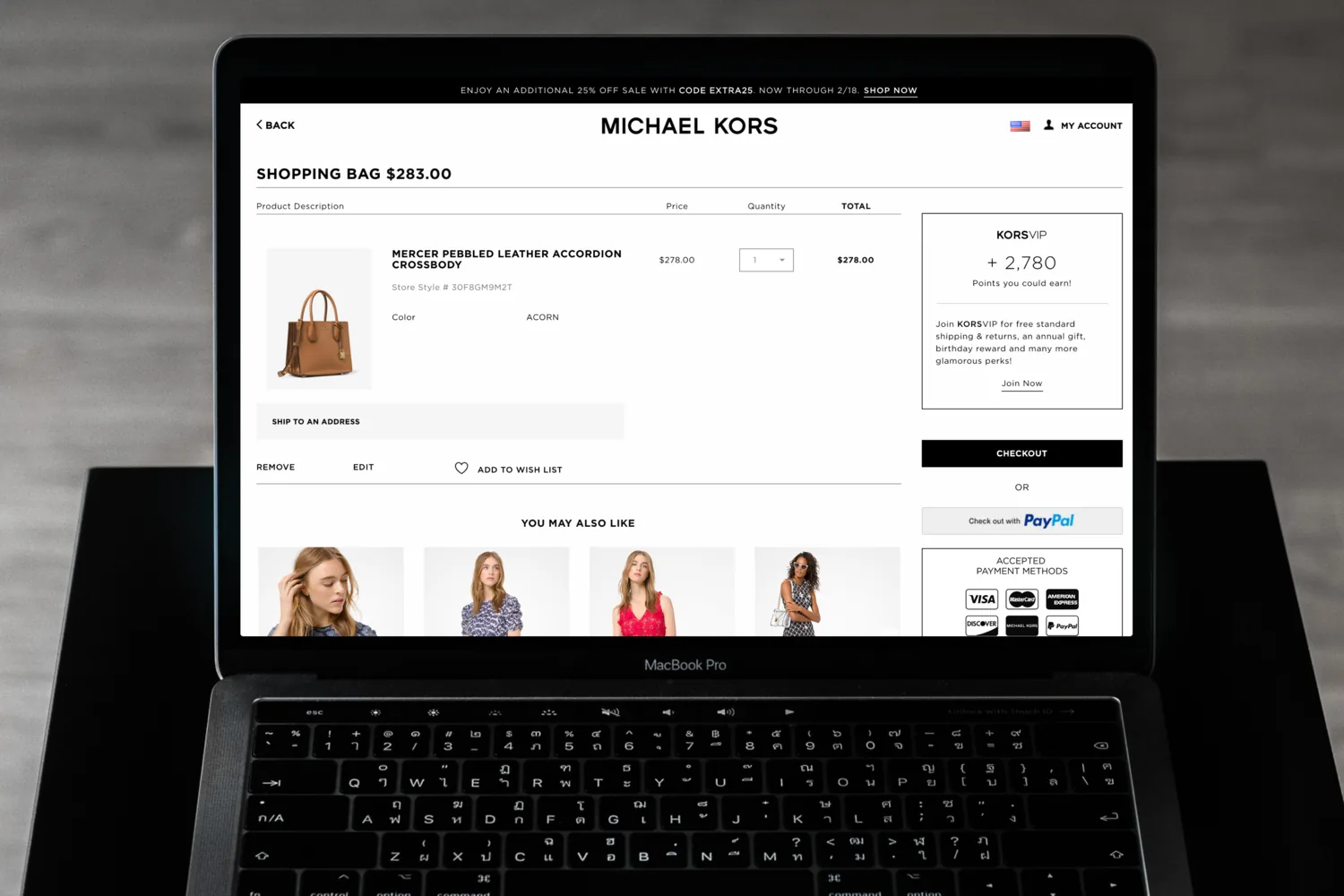 The Michael Kors shopping bag on desktop, with a KORSVIP panel showing the points this order could earn and a Join Now link